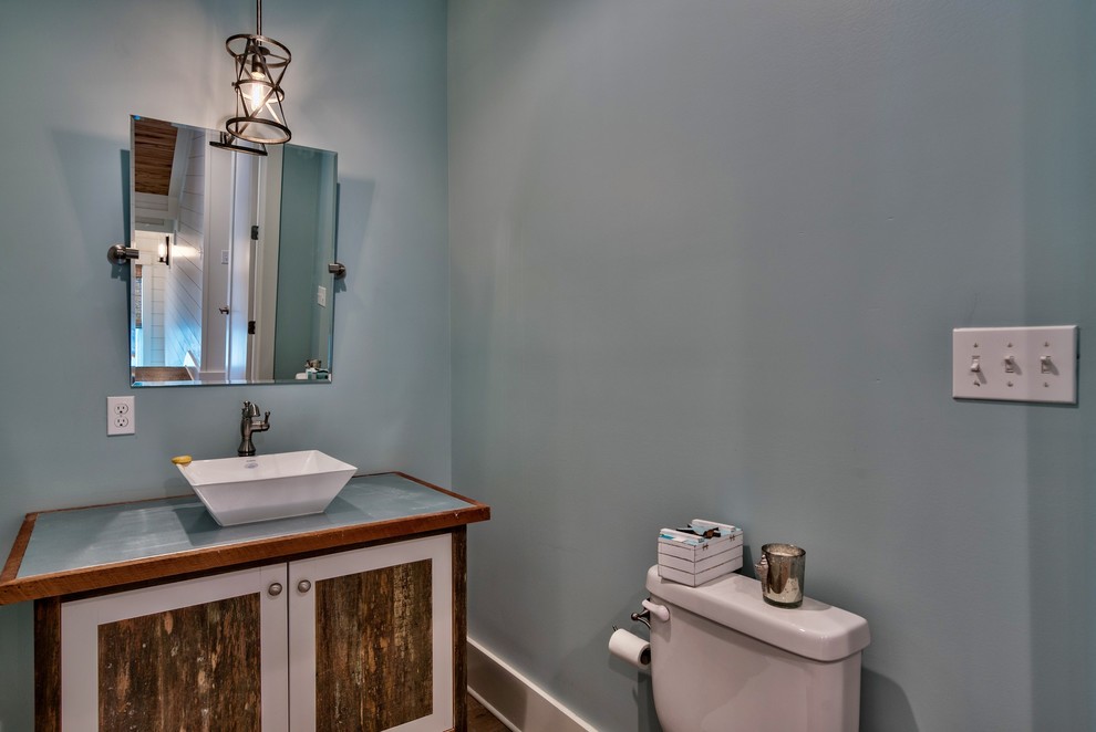 Example of a transitional home design design in Miami