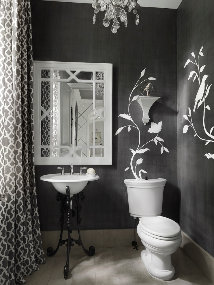 This is an example of a mid-sized contemporary powder room in St Louis with a two-piece toilet, black walls, ceramic floors, a pedestal sink and grey floor.