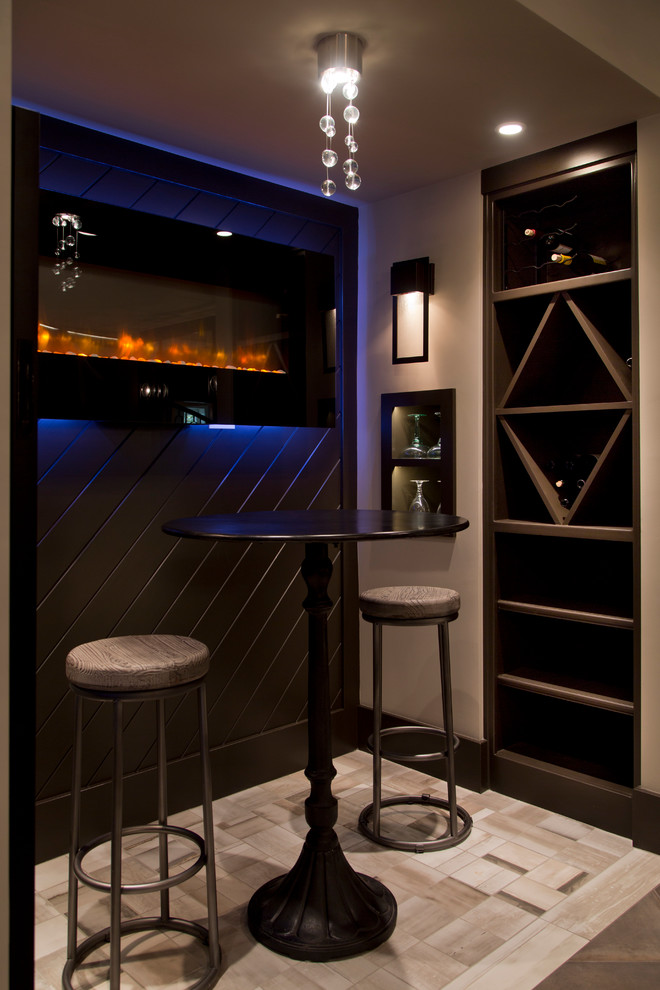 Inspiration for a small transitional wine cellar in Kansas City with ceramic floors and storage racks.