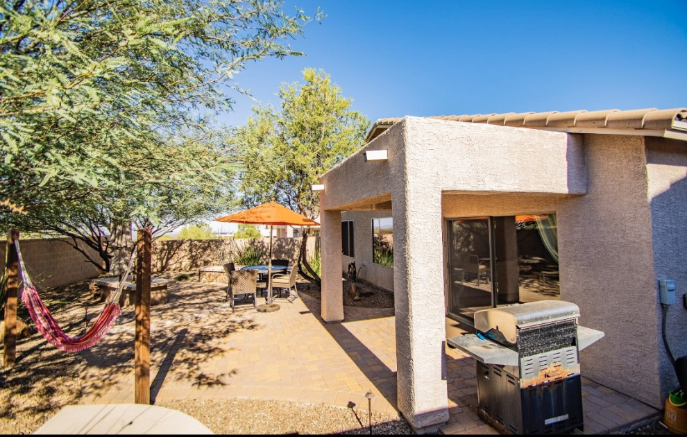 Home design - small rustic home design idea in Phoenix
