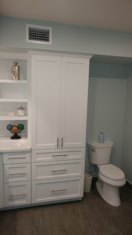 Photo of a small contemporary master bathroom in Phoenix with shaker cabinets, white cabinets, white tile, marble, green walls, ceramic floors, an undermount sink, engineered quartz benchtops and grey floor.