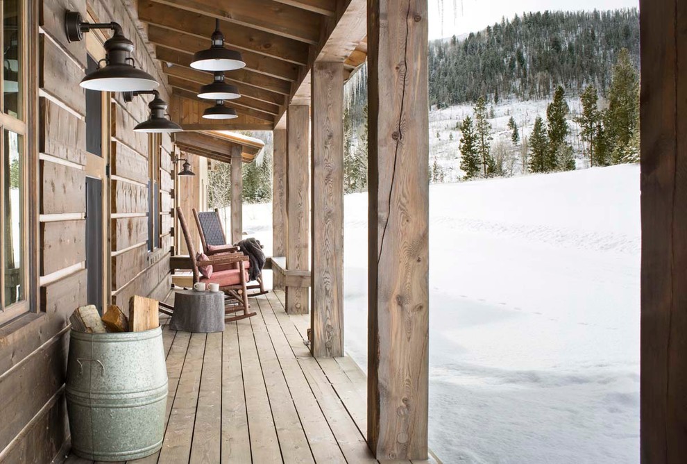 Design ideas for a large country side yard verandah in Denver with decking and a roof extension.