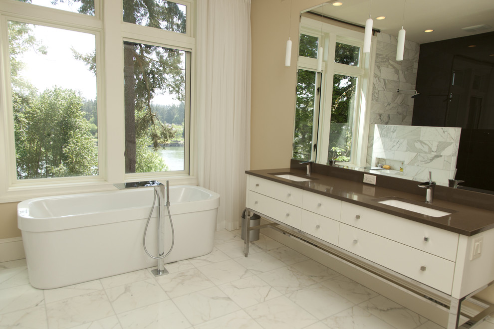 Design ideas for a contemporary bathroom in Portland with a freestanding tub.