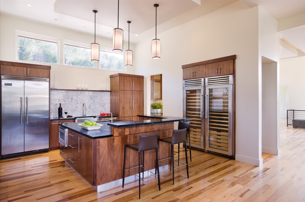 Inspiration for a contemporary kitchen in Austin with stainless steel appliances.