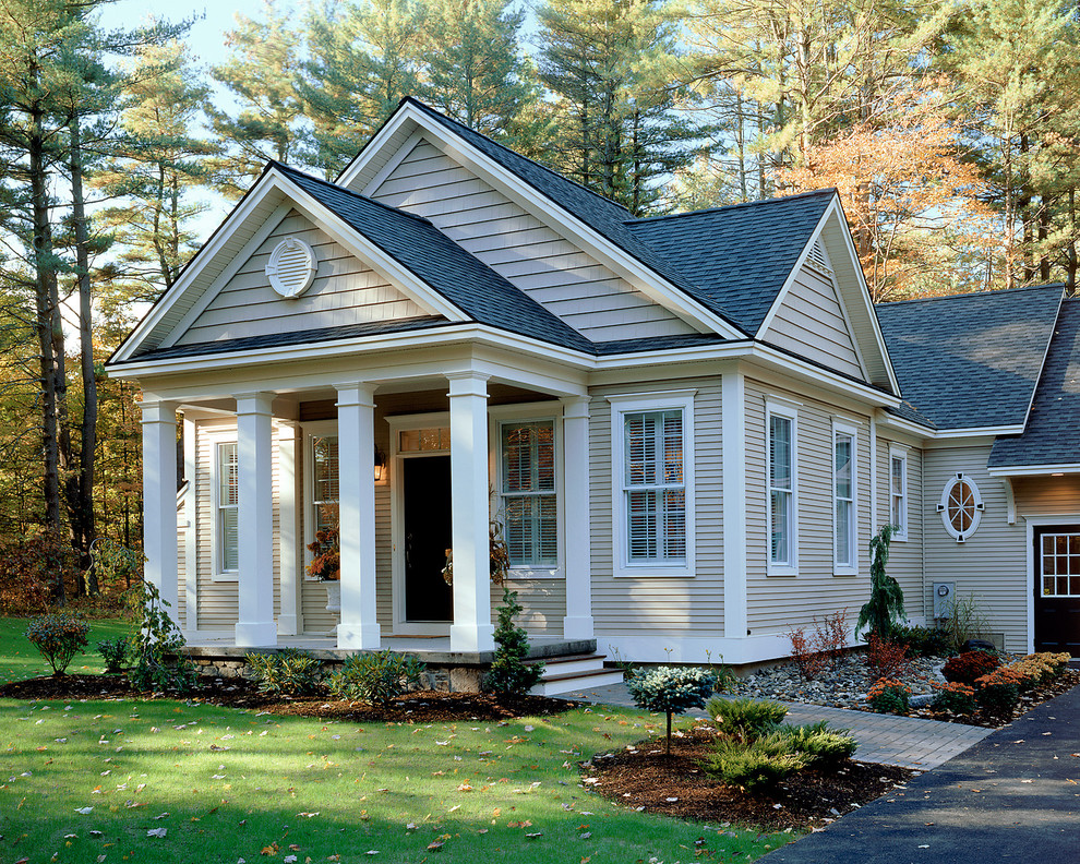 Traditional exterior in New York with wood siding and a gable roof.