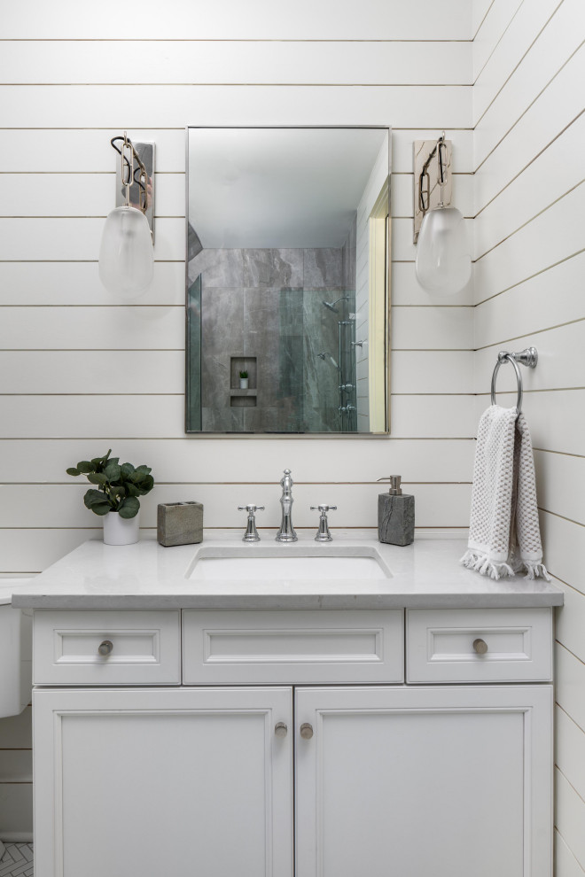 Design ideas for a small beach style 3/4 bathroom in Charleston with white cabinets, white walls, white benchtops, a single vanity and planked wall panelling.
