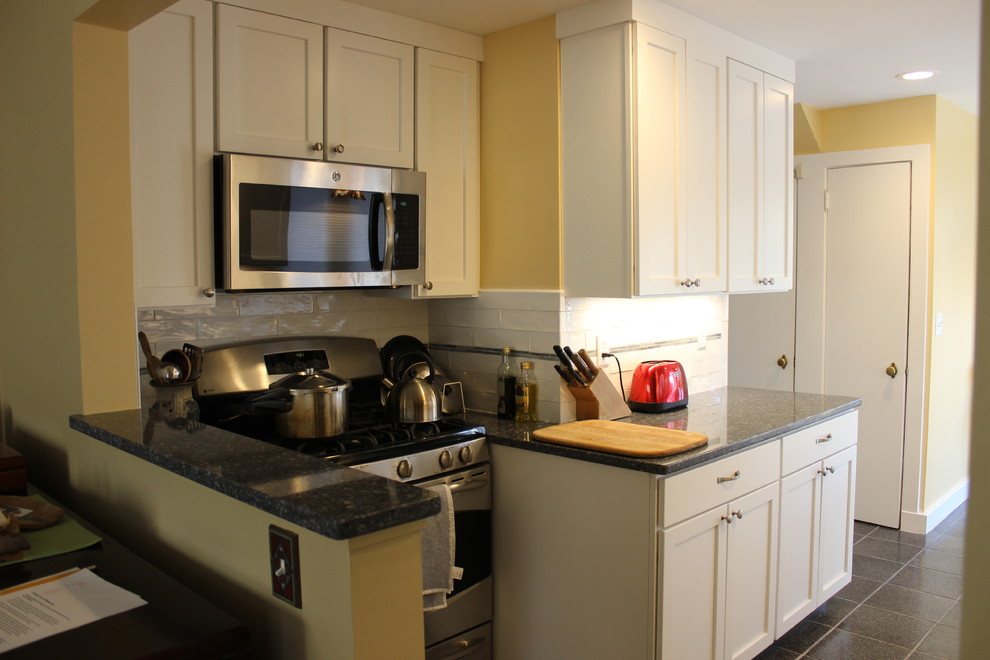Small contemporary galley eat-in kitchen in Providence with flat-panel cabinets and no island.