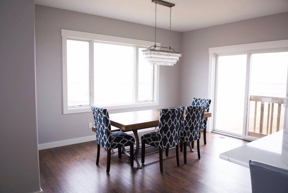 Inspiration for a mid-sized transitional dark wood floor and brown floor kitchen/dining room combo remodel with gray walls and no fireplace