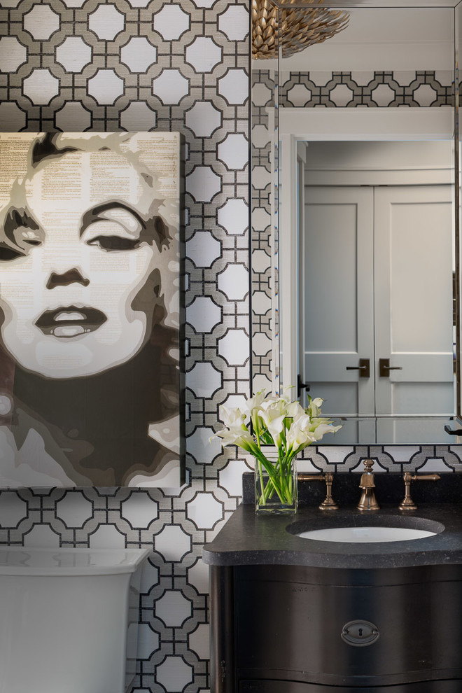 Example of a transitional powder room design in San Francisco with an undermount sink, furniture-like cabinets, black cabinets and multicolored walls