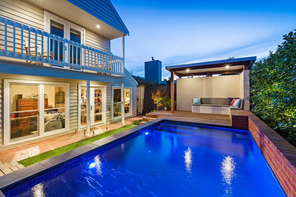 Design ideas for a small modern backyard rectangular pool in Melbourne.