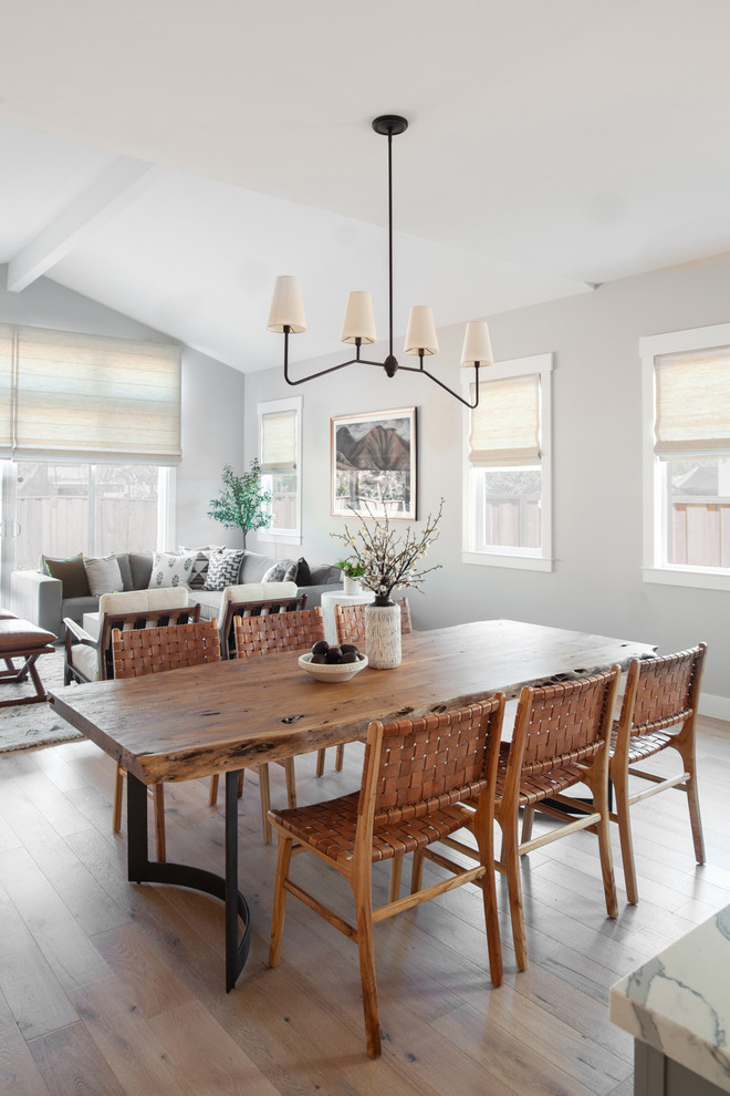 This is an example of a beach style dining room in San Francisco.
