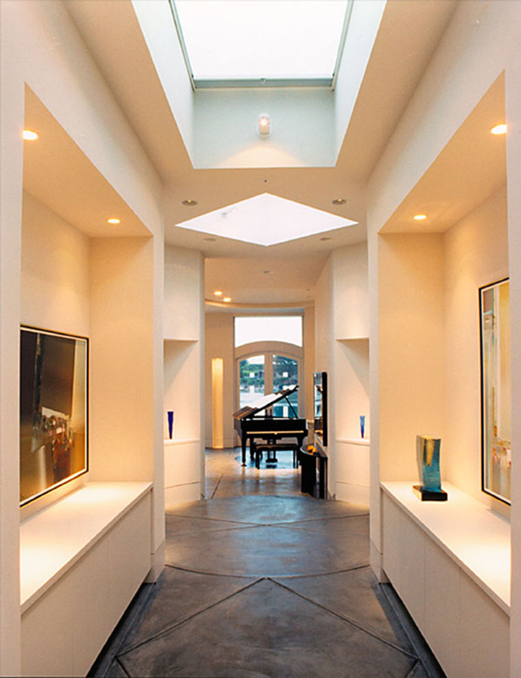 Contemporary hallway in San Francisco with concrete floors.