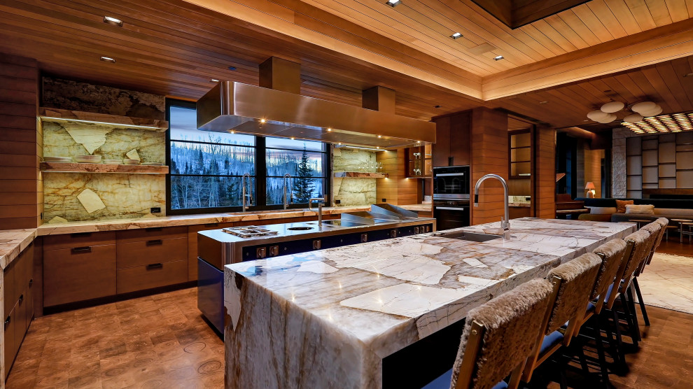 Inspiration for a large modern open plan kitchen in Salt Lake City with an undermount sink, glass-front cabinets, medium wood cabinets, marble benchtops, multi-coloured splashback, marble splashback, stainless steel appliances, medium hardwood floors, multiple islands, brown floor, multi-coloured benchtop and wood.