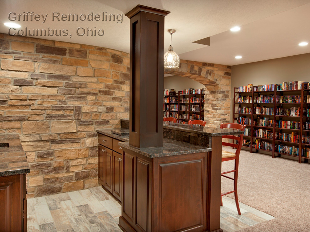 This is an example of a contemporary basement in Columbus.