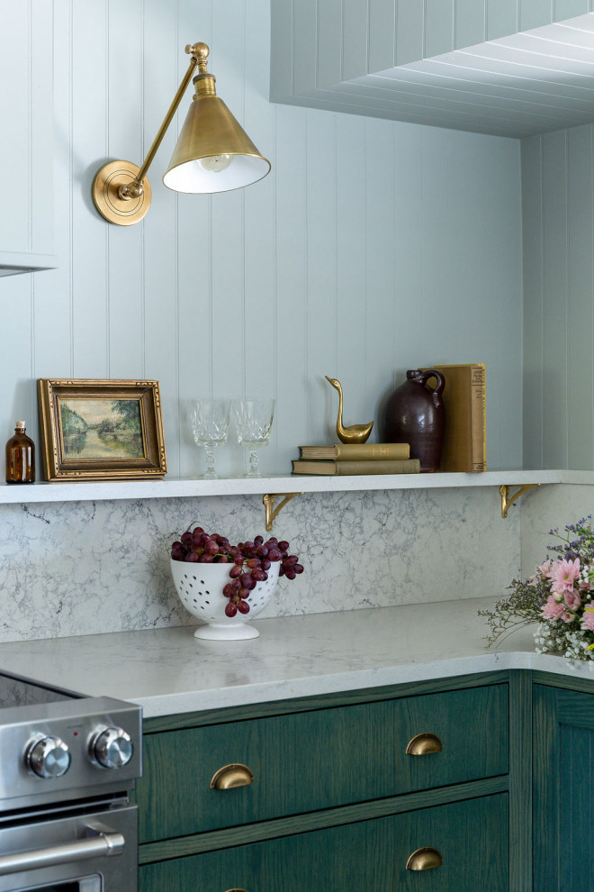 Inspiration for a mid-sized transitional galley shiplap ceiling kitchen remodel with shaker cabinets, green cabinets, quartz countertops, white backsplash, quartz backsplash, stainless steel appliances and white countertops