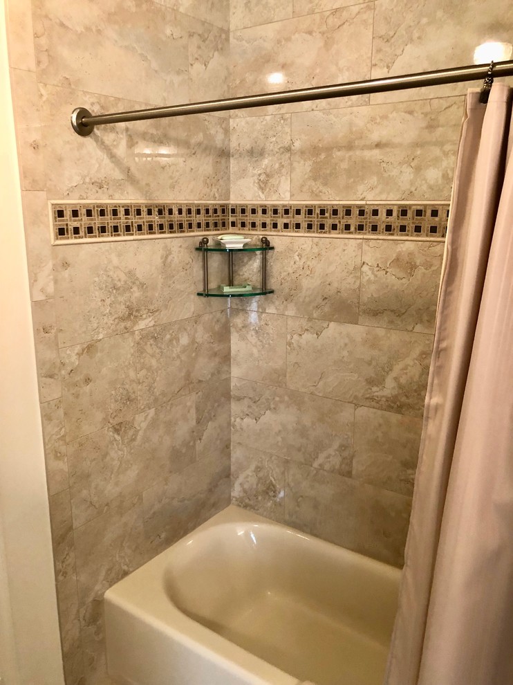 Inspiration for a transitional 3/4 brown tile and porcelain tile alcove bathtub remodel in DC Metro