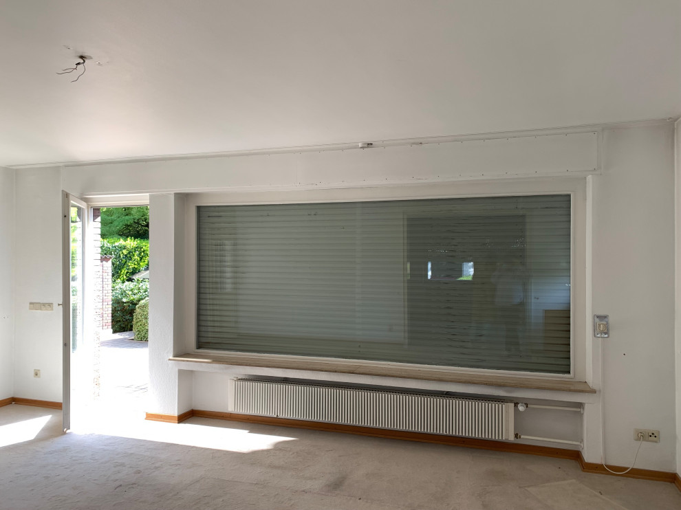 Modernisierung Einfamilienhaus mit Erweiterung der Gauben und  Fensteraufteilung