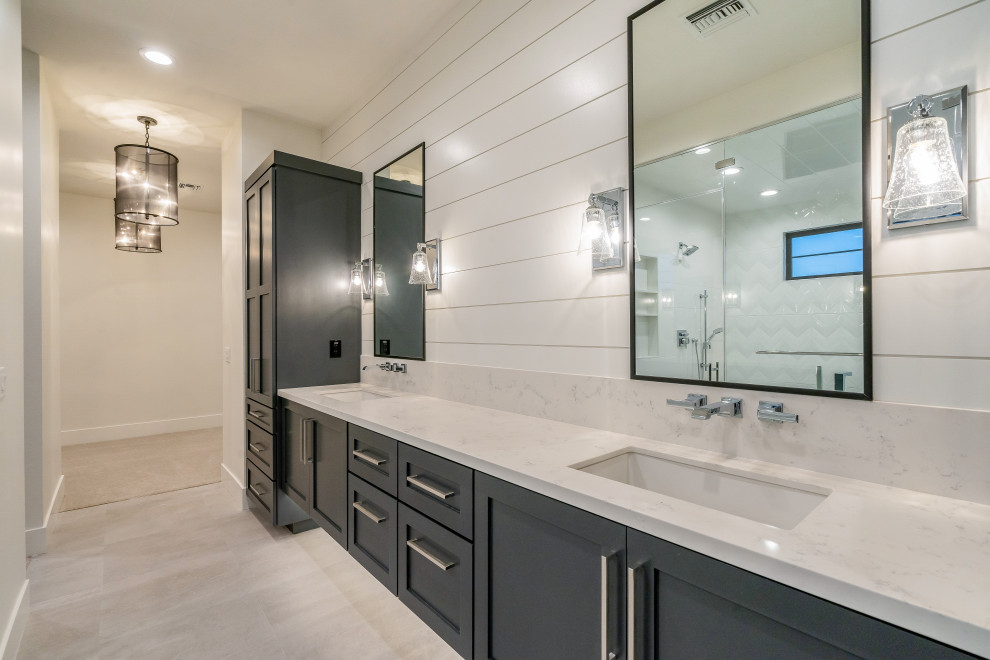 Freestanding bathtub - master double-sink and shiplap wall freestanding bathtub idea in Phoenix with a floating vanity