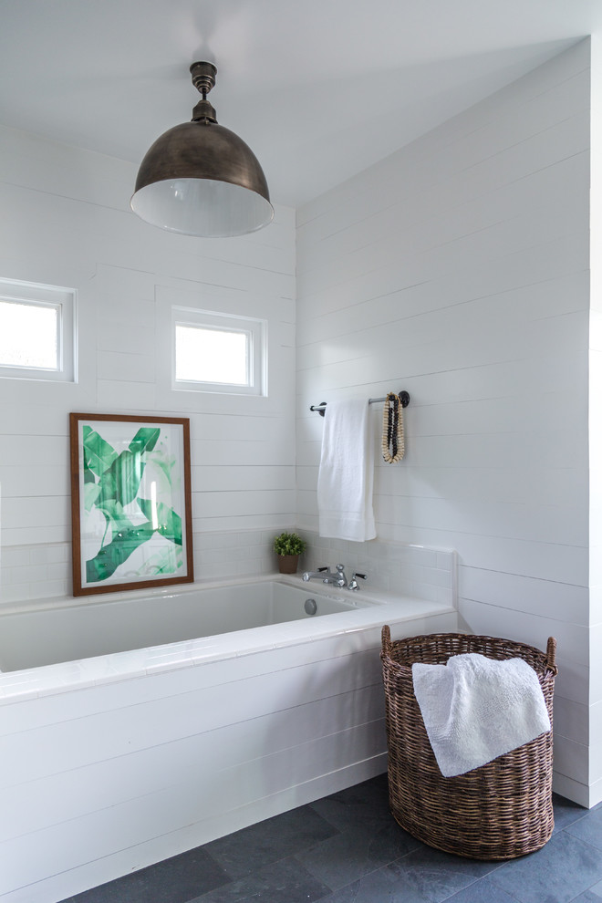Design ideas for a transitional bathroom in Orange County with an undermount tub, white tile, subway tile and white walls.