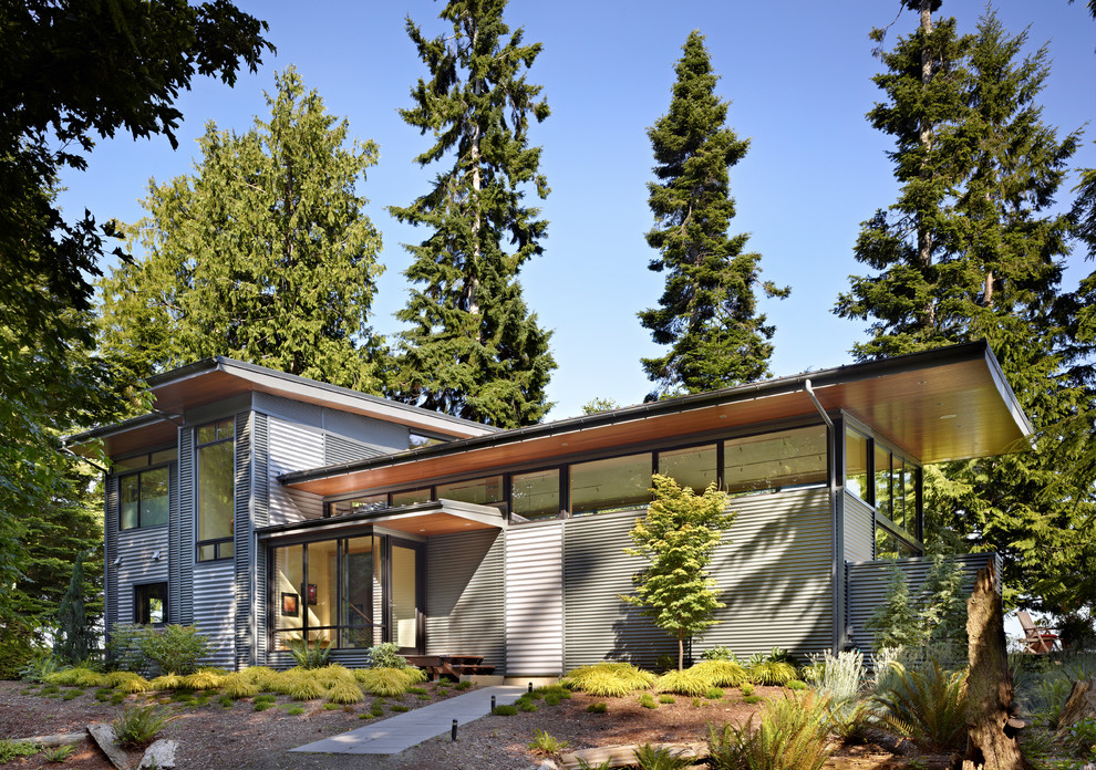 Inspiration for a modern exterior in Seattle with metal siding.