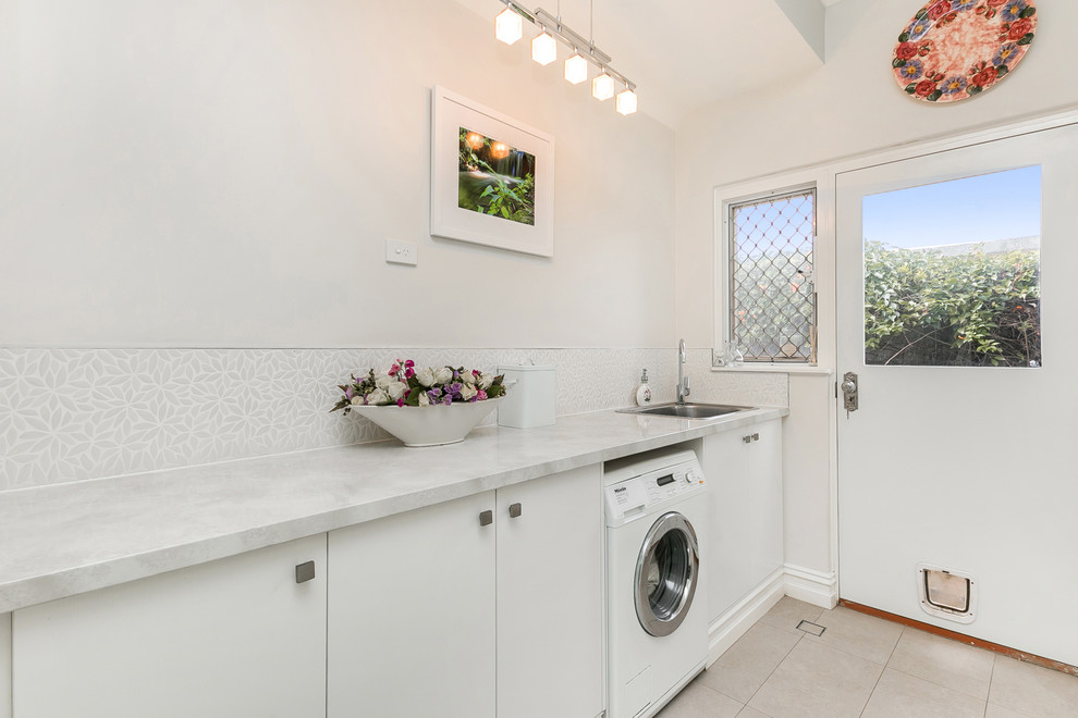 Photo of a transitional laundry room in Perth.
