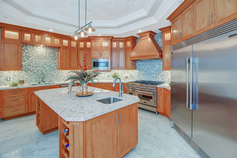 Design ideas for a large contemporary eat-in kitchen in Orange County with granite benchtops and with island.