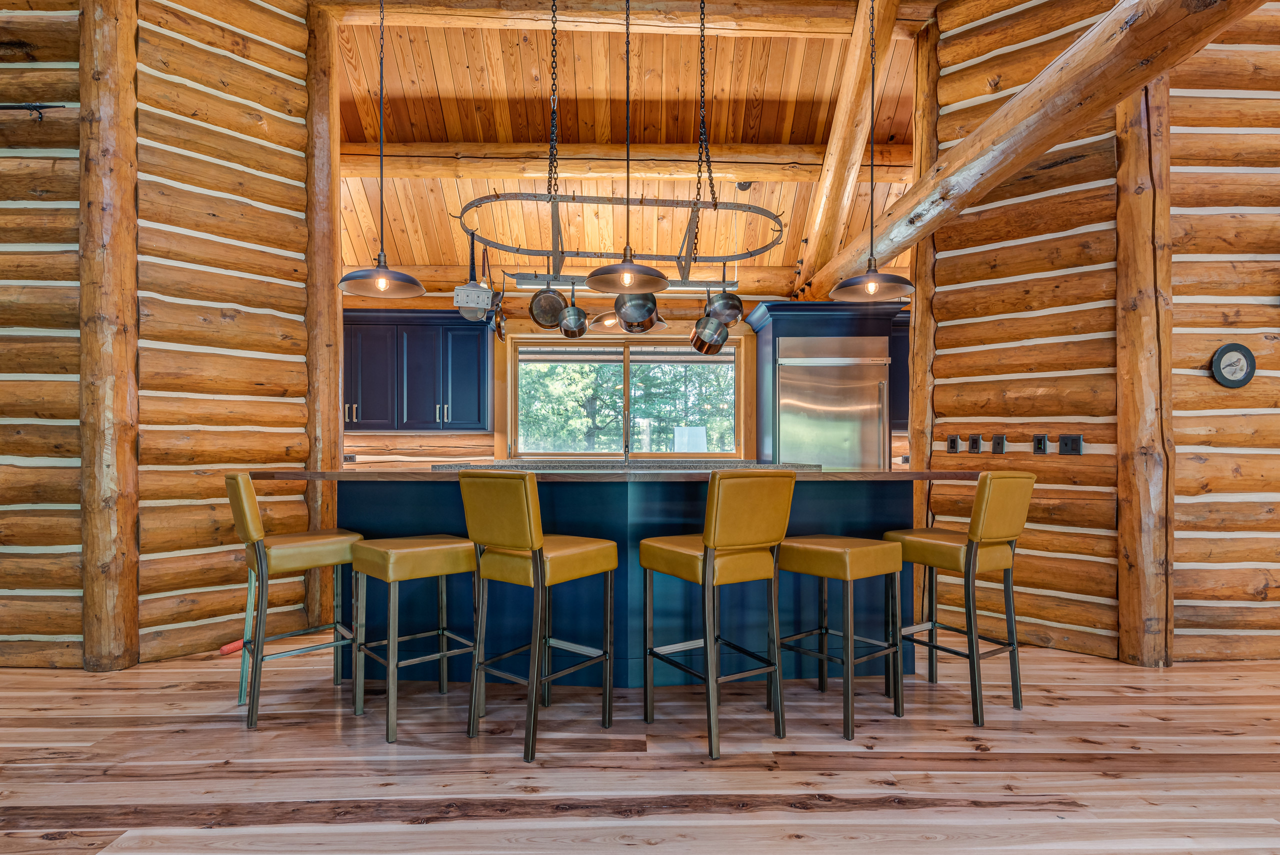 The natural elements of this stylish log cabin home and blended nicely with with a chic modern edge.