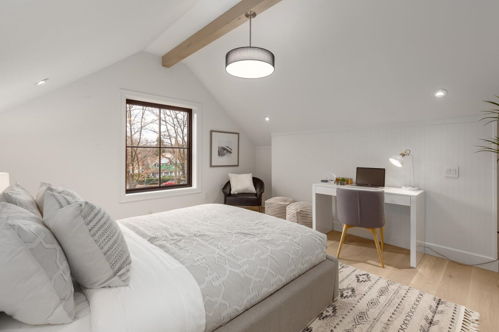 Example of a transitional home design design in Vancouver