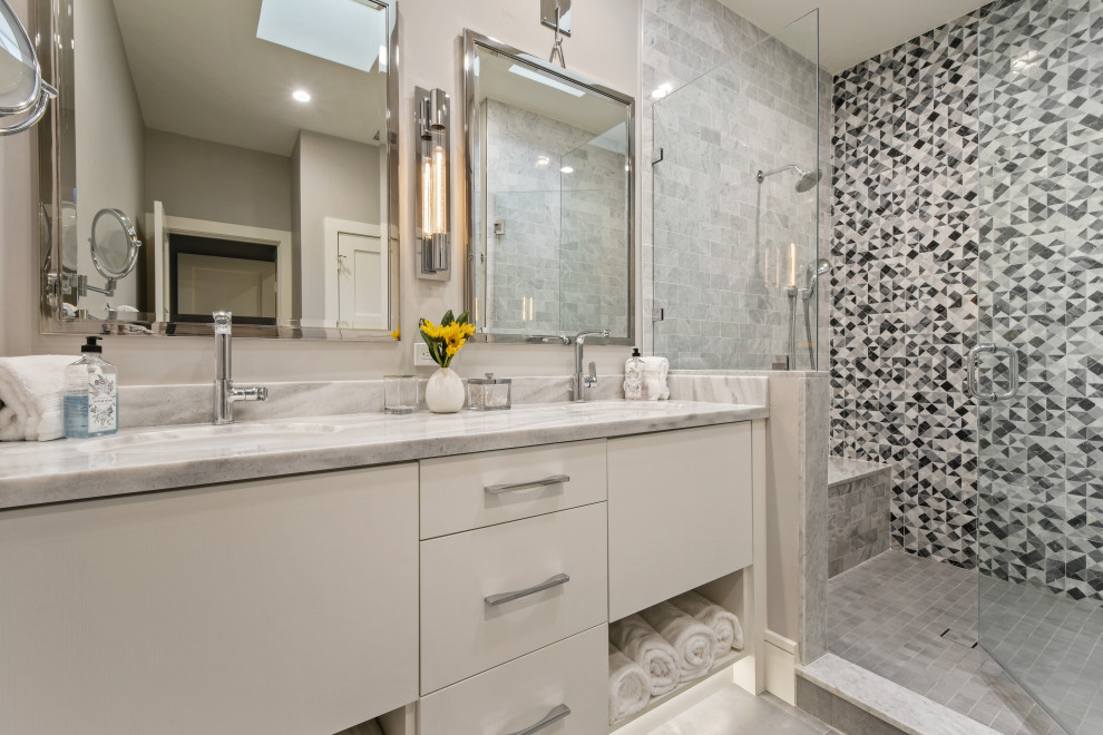 Example of a mid-sized beach style light wood floor and gray floor bathroom design with gray cabinets