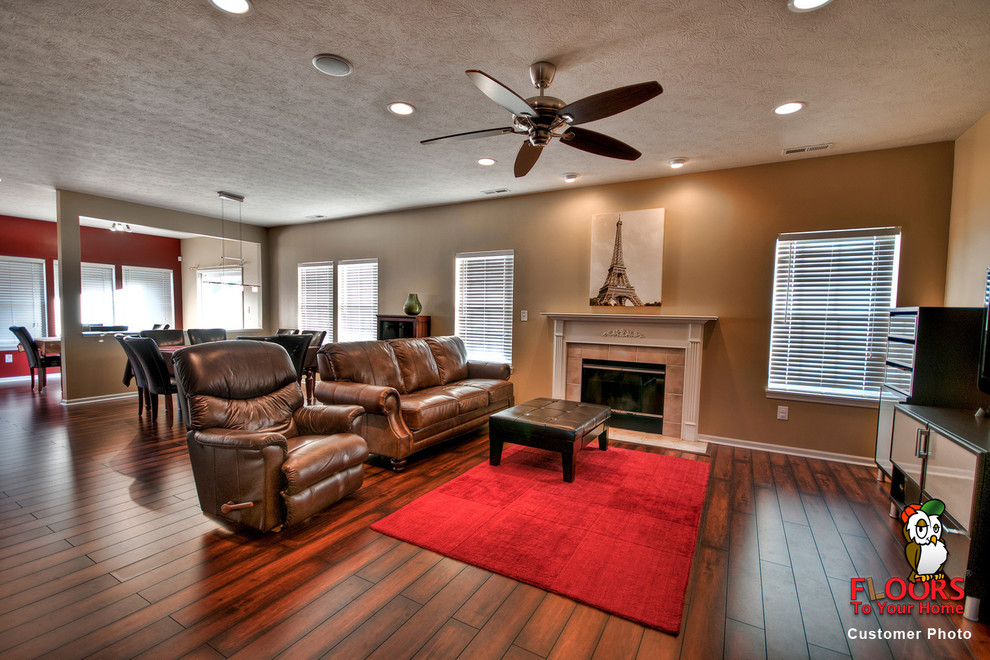 Traditional living room in Indianapolis with laminate floors.