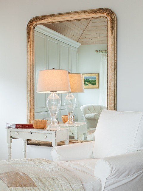 Example of a mid-sized transitional master light wood floor bedroom design in New York with yellow walls and no fireplace