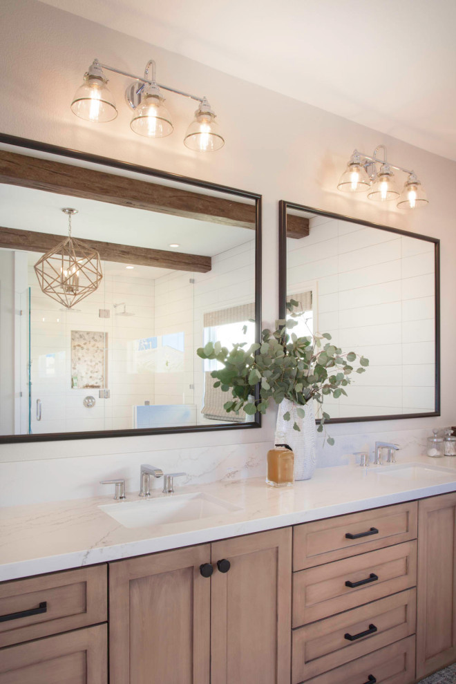 Example of a large country master white tile and cement tile porcelain tile, brown floor, double-sink, exposed beam and shiplap wall bathroom design in San Diego with recessed-panel cabinets, brown cabinets, a two-piece toilet, white walls, an undermount sink, quartz countertops, a hinged shower door, white countertops and a built-in vanity