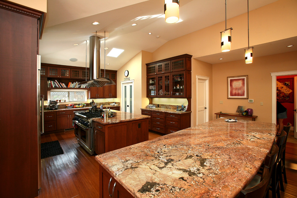 Design ideas for an arts and crafts kitchen in San Francisco with glass-front cabinets and stainless steel appliances.