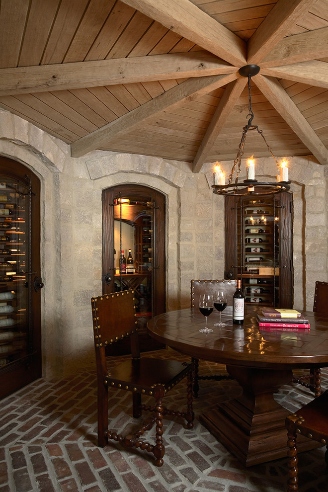Photo of a traditional wine cellar in Minneapolis with brick floors and red floor.
