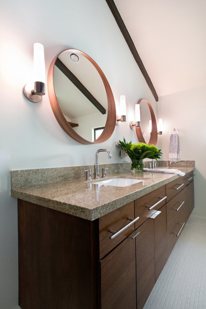 Mid-sized midcentury master bathroom in Denver with an undermount sink, flat-panel cabinets, medium wood cabinets, granite benchtops, a corner shower, a one-piece toilet, white tile, stone tile, white walls and porcelain floors.