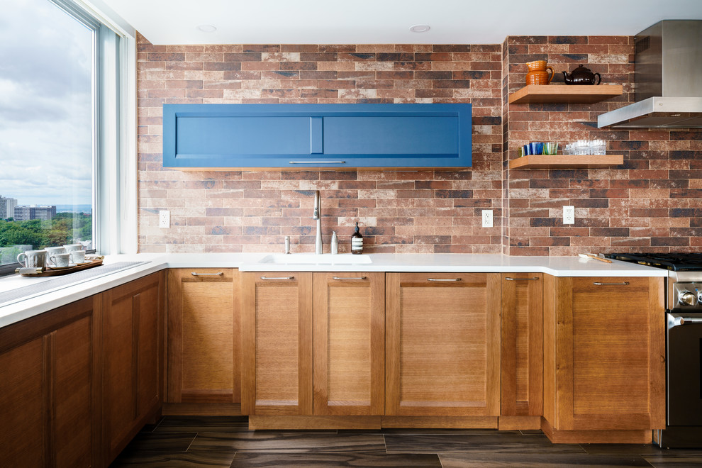 Transitional kitchen photo in Seattle with shaker cabinets and medium tone wood cabinets