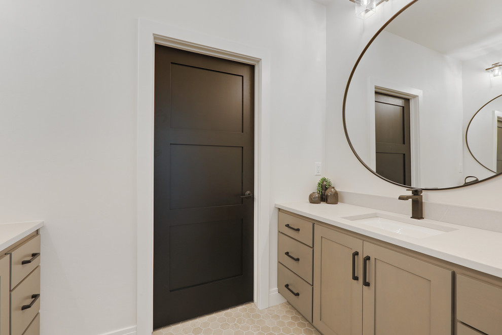 Large transitional kids' porcelain tile, brown floor and double-sink bathroom photo with shaker cabinets, brown cabinets, white walls, an undermount sink, quartz countertops, white countertops and a built-in vanity