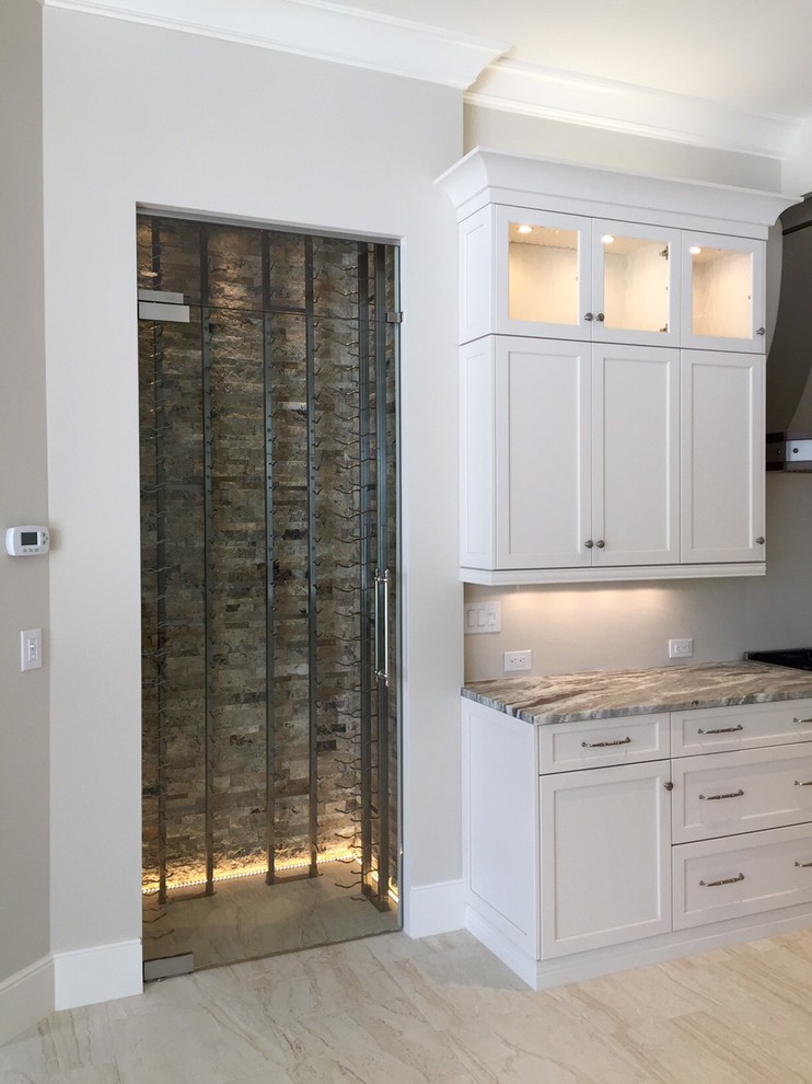 Inspiration for a mid-sized transitional l-shaped porcelain tile open concept kitchen remodel in Miami with shaker cabinets, white cabinets, granite countertops, stainless steel appliances and an island