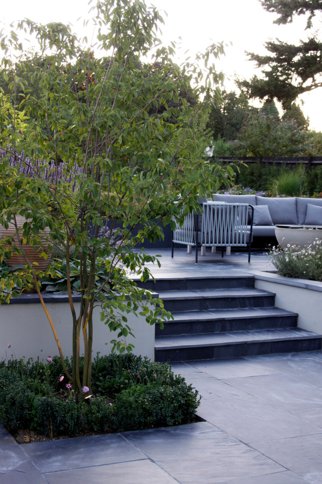 Inspiration for a large contemporary garden in Kent.
