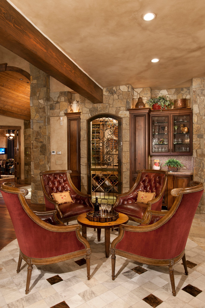 Photo of a mid-sized traditional wine cellar in Denver with medium hardwood floors.