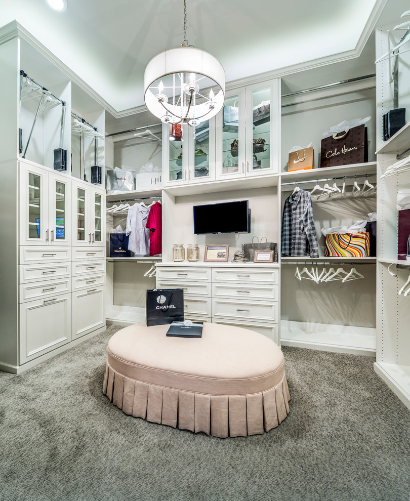 Design ideas for a traditional women's dressing room in Phoenix with recessed-panel cabinets, white cabinets, carpet and grey floor.