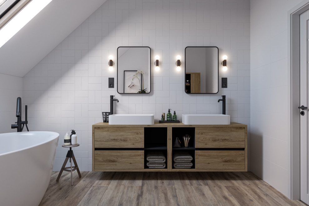Photo of a mid-sized modern kids bathroom in Other with flat-panel cabinets, brown cabinets, a freestanding tub, a wall-mount toilet, white tile, ceramic tile, white walls, ceramic floors, a console sink, laminate benchtops, brown floor, brown benchtops, a double vanity and a floating vanity.