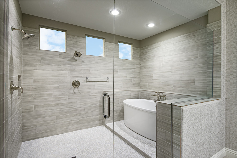 Photo of a contemporary master bathroom in Denver with gray tile.