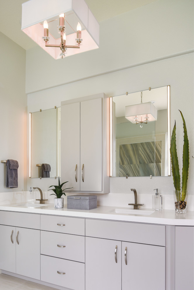Inspiration for a large modern master bathroom in San Francisco with flat-panel cabinets, grey cabinets, a curbless shower, a one-piece toilet, beige tile, ceramic tile, grey walls, ceramic floors, an undermount sink, engineered quartz benchtops, beige floor and an open shower.