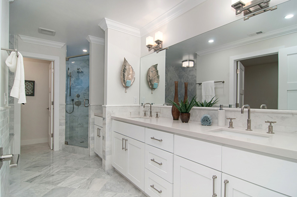 Design ideas for a contemporary master bathroom in San Diego with shaker cabinets, white cabinets, engineered quartz benchtops, a hinged shower door, white walls, an undermount sink and multi-coloured floor.