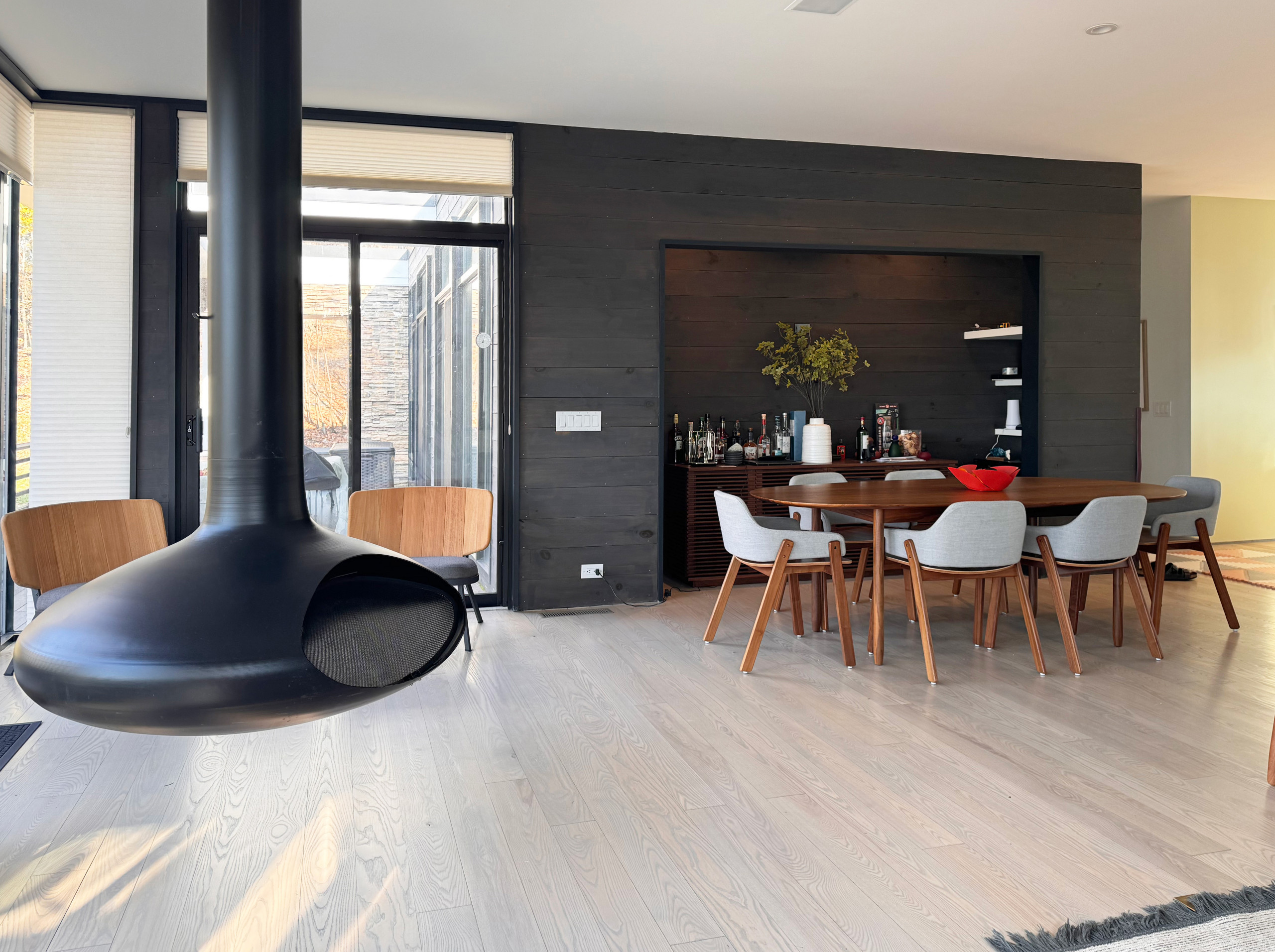 Curated furniture, a refreshed wood floor color, and thoughtful layout updates blending modern elegance with cozy charm.