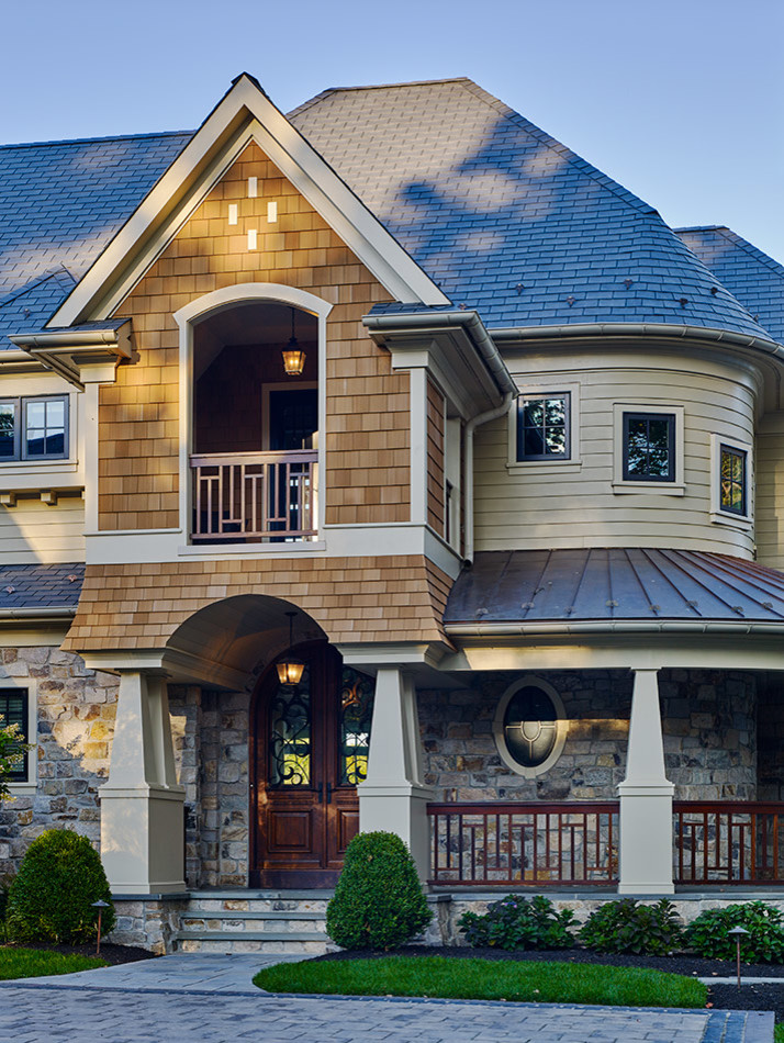 Inspiration for a mid-sized transitional two-storey brown exterior in Philadelphia with mixed siding and a gable roof.