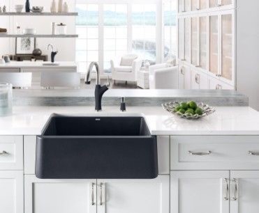 Inspiration for a cottage eat-in kitchen remodel in Dallas with a farmhouse sink