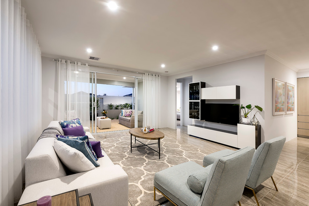 This is an example of a mid-sized modern open concept living room in Perth with white walls, porcelain floors and a wall-mounted tv.
