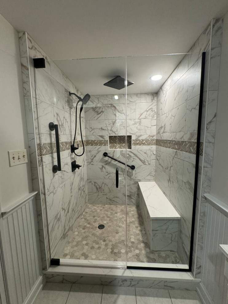 Walk-In Shower with Marble-Look Tile and Black Fixtures